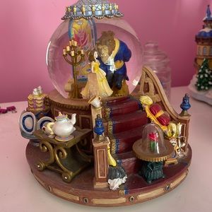 Disney beauty and the beast snow globe.